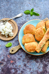 Bakery .Home made mini   cheese pie  with phyllo pastry, white feta cheese  and organic eggs. Bulgarian banitsa