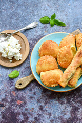 Bakery .Home made mini   cheese pie  with phyllo pastry, white feta cheese  and organic eggs. Bulgarian banitsa