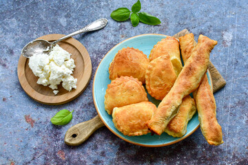 Bakery .Home made mini   cheese pie  with phyllo pastry, white feta cheese  and organic eggs. Bulgarian banitsa