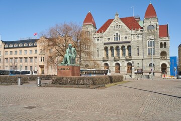 Finland. Helsinki. April 15, 2021 View of the square near the railway station and city buses
