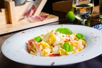 Tagliatelle with gorgonzola masarpone sauce and ham.
