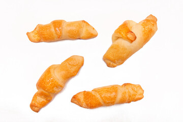 Fresh homemade cakes. Buns. Croissants isolated on white background