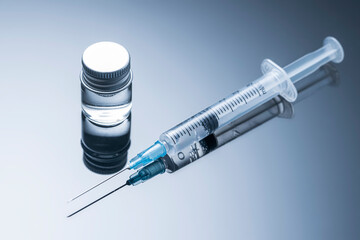 Medication drug needle syringe drug,medical Vaccine vial hypodermic injection treatment disease care in hospital and prevention illness. Close-up of the antidote
