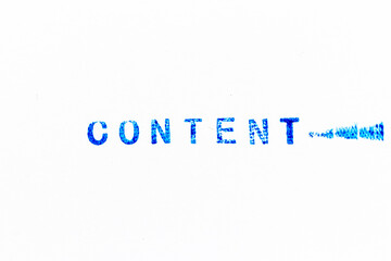 Blue color ink of rubber stamp in word content on white paper background