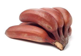 ripe tropical tasty red bananas on white background