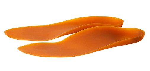 Orange  medical insoles isolated on a white background with clipping path. Insert in shoes to support the foot. Orthotics
