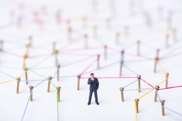miniature people on complex web line connection