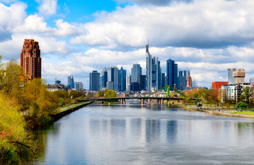 View of the Frankfurt skyline with the Main river and the Flösserbrücke in the foreground