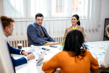 Fototapeta premium Cinematic image of employers working in a start up business