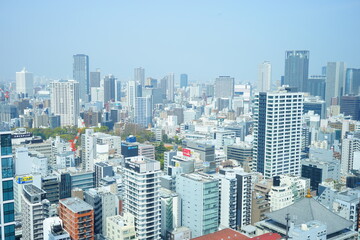Naklejka premium Aerial view of Osaka city in japan - 日本 大阪 本町 街並み 高層ビル