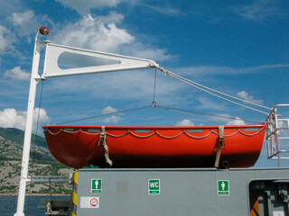 a red lifeboat or rescue boat