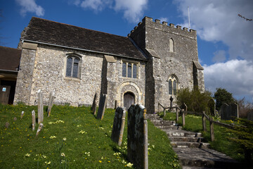 Fototapeta na wymiar St Nicholas Church in Bramber next to the ruins of Bramber Castle footage on a sunny day in springtime. Footage