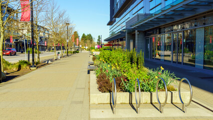Deserted High Street at a Burnaby Mountain residential community during COVID restrictions - spring