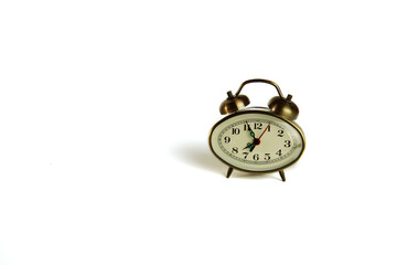Beautiful alarm clock on a white background. retro, vintage watches