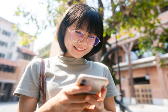 Young adult business asian woman consumer using creadit card and smartphone for shopping online.