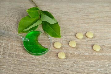 pills, capsules, creating a new medicine from plants, biologically active substances in a chemical laboratory, concept science, genetic engineering, natural medicine
