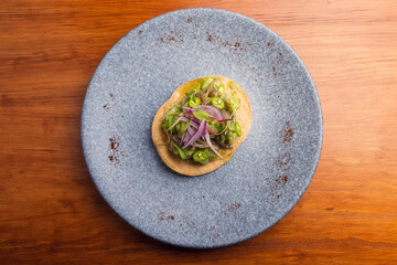 Set of different meat and seafood skewers on wooden table