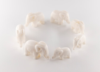 Seven vintage  marble figurines of elephants as a symbol of prosperity 
