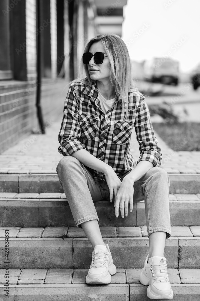 Sticker fashion portrait of beautiful woman with beautiful face, wearing grunge plaid shirt. posing alone.