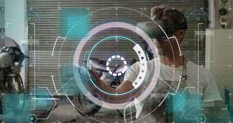 Data processing and scope scanning over caucasian man wearing vr headset in the garage - Powered by Adobe