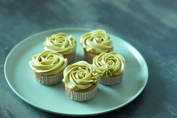 Cupcake topped sweet italian cream with green tea flavor