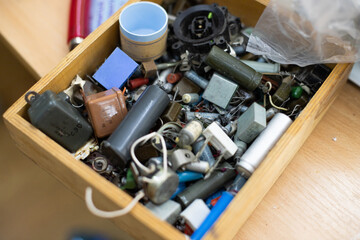 various radio parts in a box on the table