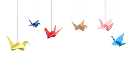 Hanging colorful origami paper birds on white