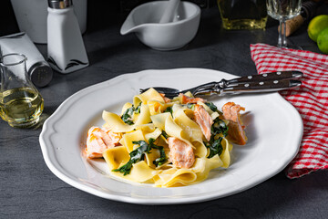 Tagliatelle with salmon and spinach in a cream sauce