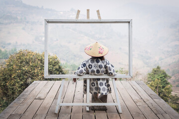 Lady in the frame with Yukata shirt look over the scenic landscape view 
