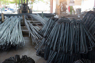 Stainless Steel wire Rolls in construction site. Closeup of Metal Steel reinforced rod for concrete in store. Construction Concept.