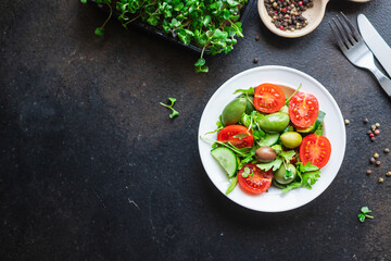 fresh salad vegetables olives tomato, cucumber, lettuce mix leaves snack trend meal copy space food background rustic. top view keto or paleo diet vegan or vegetarian food