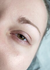 Lash extensions in beauty salon macro eye 
