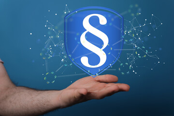 Businessman using 3D rendering digital paragraph law symbol