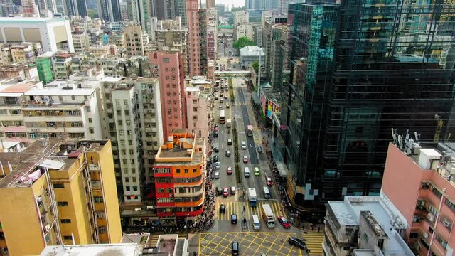 Downtown Hong Kong buildings, Crosswalk and traffic, High altitude aerial view.