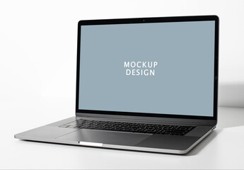 Laptop Screen Mockup on White Table