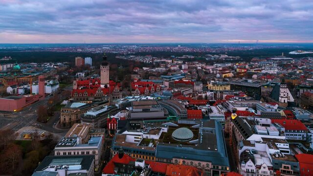 Leipzig, Germany. Aerial view of city center in Leipzig, Germany during the sunset. Main landmarks from day to night