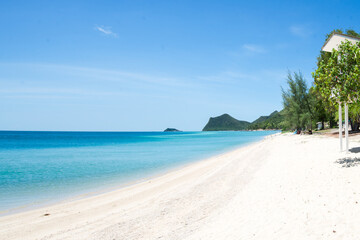Beautiful wide of seascape with blue sky at daylight. Sand of beach smooth Sea.