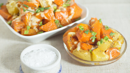 A dish of pumpkin and potatoes in sour cream sauce