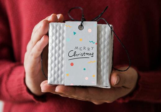 Woman Holding Gift Box and Label Mockup