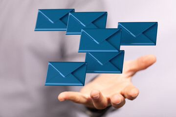  email icon concept in hand background