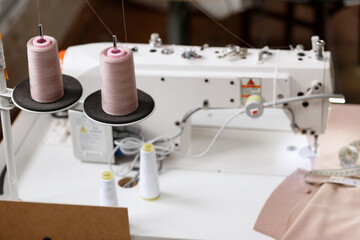 sewing machine and threads at work