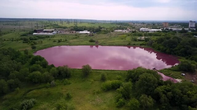 aerial landscape with industrial zone and pink tec