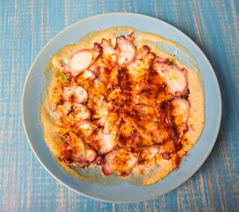 plate of food with octopus in restaurant