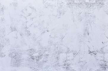 Texture of a white concrete wall for background with copy space for text.