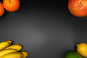 Tropical fruits on black background