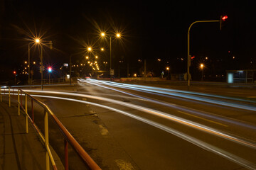 Night blurred traffic, light lines, crossroad