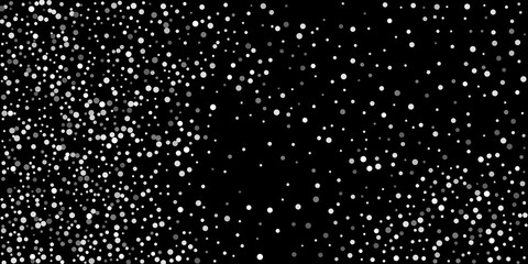 Silver shine of confetti on a black background. Luxury background.