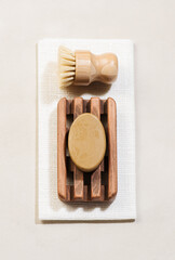 Eco friendly cleaning tools and products, Solid soap and kitchen brush lon white natural background.