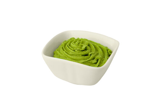Bowl with wasabi sauce isolated on white background.
