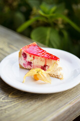 Delicious and beautiful cheesecake with strawberry jam
